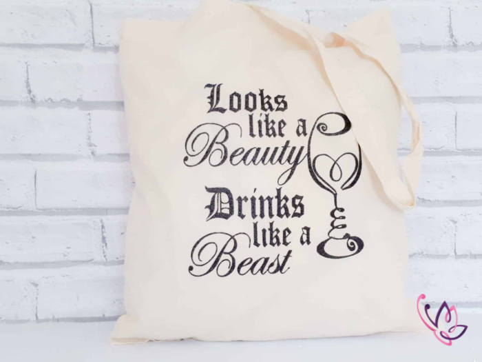 Looks like a beauty drinks like a beast canvas bag