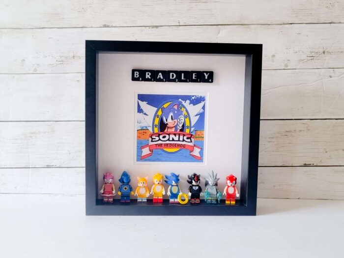 personalised Lego Sonic the hedgehog frame with minifigures and name in black scrabble tiles. 25x25cm