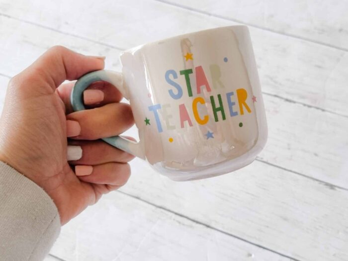 side view of star teacher mug